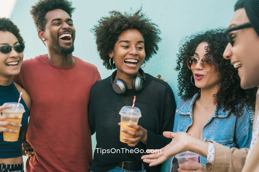 A group of people laughing and having fun together.